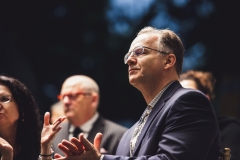 Eric Ziolkowski listens and applauds during  the Karl Stirner Arts Trail gala.