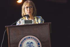 A woman speaks at a podium during the Karl Stirner Arts Trail gala.