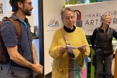 Bonnie Winfield reads a poem aloud at Easton Public Market