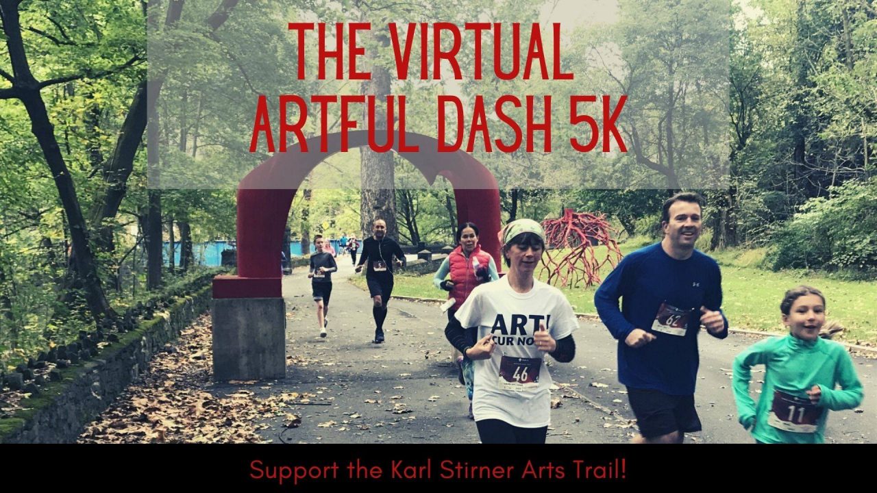 People run in the Artful Dash with the red arch in view on the Karl Stirner Arts Trail in Easton, Pennsylvania.