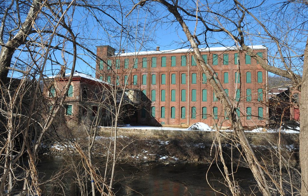 An image of the Simon Silk Mill with the Bushkill Creek in the foreground. The photo was taken by Jerrye & Roy Klotz.