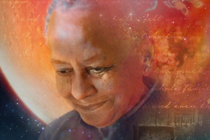 Poet Nikki Giovanni with an image of Mars behind her