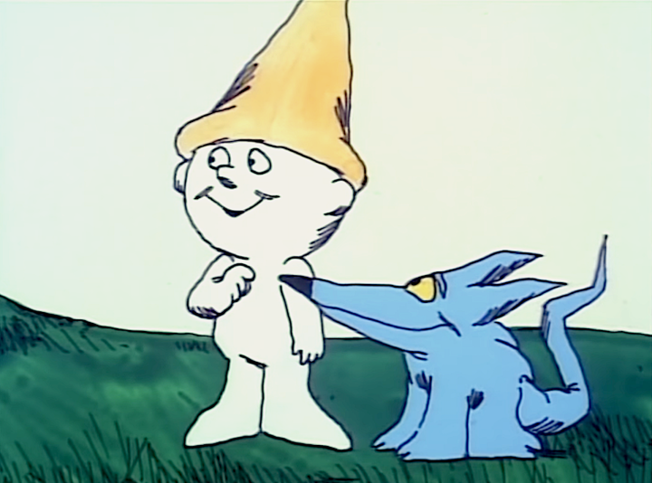 Oblio, a young boy with a pointy hat, stands next to his blue dog in the animated film The Point.